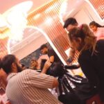 staff doing hair colour on client hair