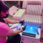 women staff showing manicure- pedicure place
