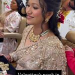 a women wearing lehenga and happiness on face getting ready by staff