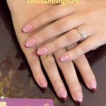 women hands with her perfect beautiful looking nails