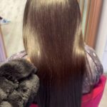 smooth, silky, straight hair of women showing