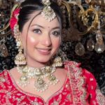 smiling women in bridal wear posing